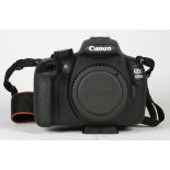 A Canon 1200D digital SLR camera, together with a Canon 18mm-55mm f3.5-f5.6 lens and a Canon 75mm-