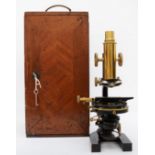 A W. Watson & Son microscope, E. Leitz Wetzler No 86735, brass, with five optics, slides, manual (