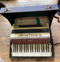 A cased Frontalini Italia accordion