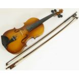 A Lark violin, cased with two bows.