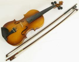 A Lark violin, cased with two bows.