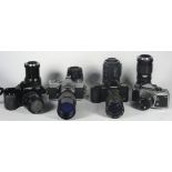 Four 35mm film cameras with lenses, to include a Minolta Dynax 7000I with a Tokina 70mm-210mm f4-