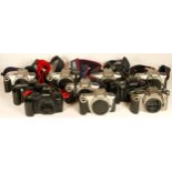 Ten Canon film camera bodies, to include a EOS 300 (x4), a EF-M, a EOS 500, EOS 500n (x2), a EOS