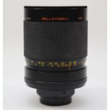 A Bell & Howell 650mm f8.5 mirror lens, with original case and three filters