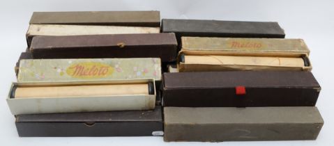 A large collection of vintage pianola music rolls, boxed.