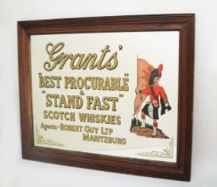 A framed Grants Whiskey pub mirror 'Best Procurable & Stand Fast' 94x68cm.