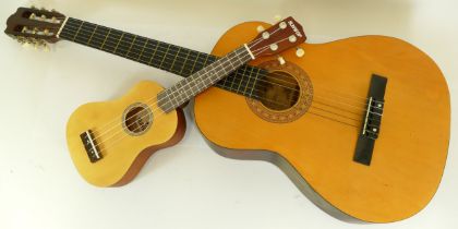 An Artisan acoustic guitar, together with a Sunwolf child's guitar with case. (2)