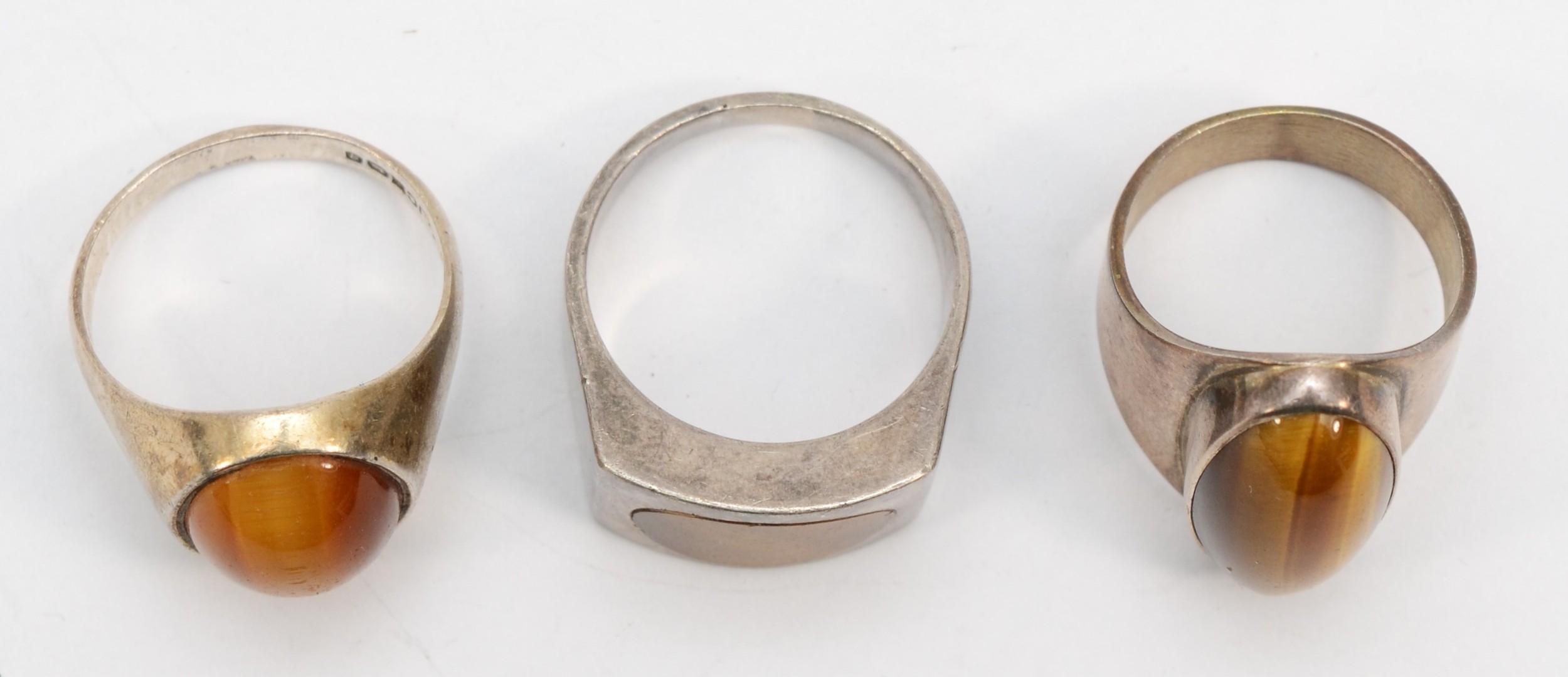 Three silver rings set with tigers eye, size P-Q, T-U, S, 24gm. - Image 2 of 2
