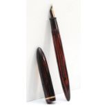 Sheaffer's, a red and black fountain pen, 13.5cm.