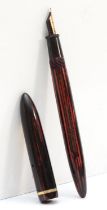 Sheaffer's, a red and black fountain pen, 13.5cm.