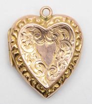 A Victorian 9ct fronted heart shaped locket, 2.5 x 2cm.