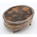 A George V silver and tortoise shell jewellery box Birmingham 1923, with lined interior, 10 x 4.5cm.