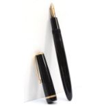 Parker, a black Duofold fountain pen with 14k gold nib, 13.5cm.