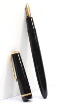 Parker, a black Duofold fountain pen with 14k gold nib, 13.5cm.