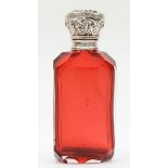 A Victorian silver topped red glass scent bottle, 8.5cm.