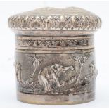 An Indian silver pot with repoussé decorated landscape with animals, 6cm, 91gm.
