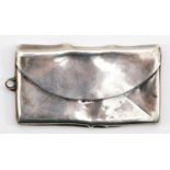 A George V silver stamp case, Birmingham 1910, in the form of a envelope, 6 x 3cm, 16gm.