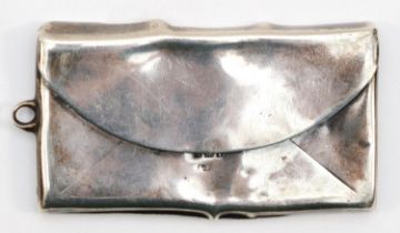 A George V silver stamp case, Birmingham 1910, in the form of a envelope, 6 x 3cm, 16gm.