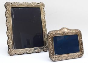 An Elizabeth II silver photograph frame with embossed floral decoration, Sheffield 1998, 25 x