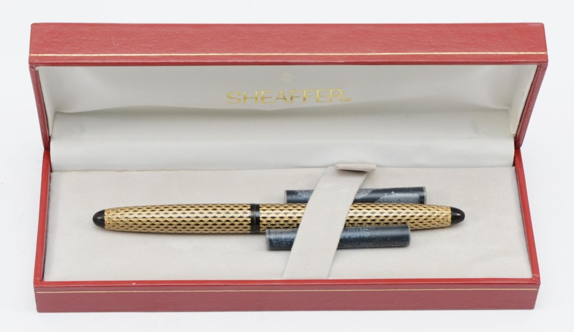 Sheaffer, a boxed gold plated fountain pen, 13.5cm.