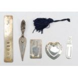 A group of silver bookmarks to include a Victorian trowel stamped silver, 27gm combined.
