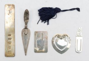 A group of silver bookmarks to include a Victorian trowel stamped silver, 27gm combined.