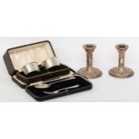 A George VI pair of silver napkin rings, Birmingham 1937, 48gm, cased, with a pair of silver
