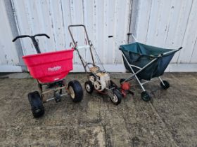 a Little Wonder petrol deluxe garden edge trimmer, Briggs and Stratton engine, an Earthway ev-n-