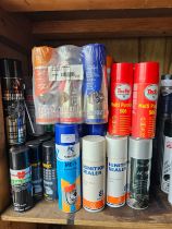 A large quantity of multi purpose aerosol cans and cleaning fluids.