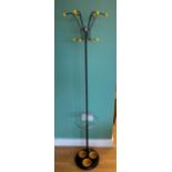 A 1950s cast and chrome coat stand by Hago of London, having swivel top with lower umbrella rack and