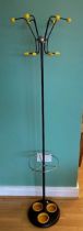 A 1950s cast and chrome coat stand by Hago of London, having swivel top with lower umbrella rack and