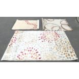 A modern Carat ivory ground carpet, 200 x 290cm, and two others.