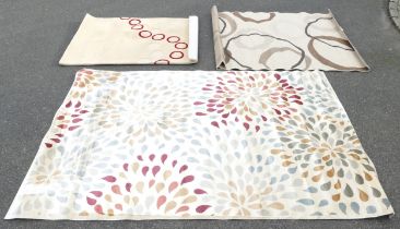 A modern Carat ivory ground carpet, 200 x 290cm, and two others.