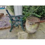 A pair of cast metal bench ends, a pair of table ends and a galvanised washing tub with soap holder