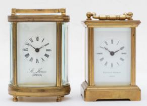 An oval brass cased carriage clock, 8cm, together with another carriage clock.