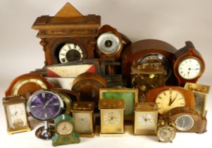 A collection of mid 20th century and later clocks, to include mantel clocks, carriage clocks, desk