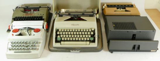 A collection of mid 20th century type writers.