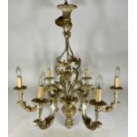 A substantial five branch chandelier gilt painted wood, with associated wall lights
