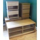 A pair of modern teak look bedside chest of drawers, together with a matching tallboy chest of