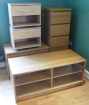 A pair of modern teak look bedside chest of drawers, together with a matching tallboy chest of