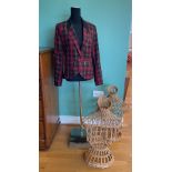 A stainless steel freestanding ex-shop manikin, together with a pair of wicker clothes busts. (3)