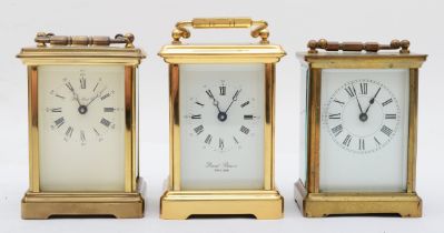 Three brass cased 8 day carriage clocks.