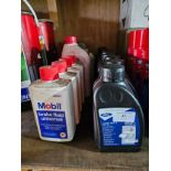 Various containers of clutch and brake fluid.