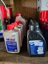 Various containers of clutch and brake fluid.