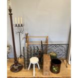 A collection of homewares, to include a turned wood standard lamp, a wrought iron candlestick stand,
