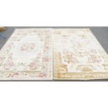 Two modern floral cream ground carpets, 290 x 197xm, ex stock.