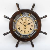 A ships wheel 8 day wall clock, 36cm.