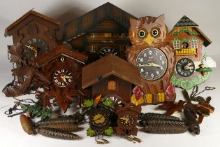 A collection of manual wind cuckoo and novelty wall clocks, for spares or repair.