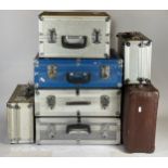 A collection of metal and other flight cases.