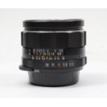 A Takumar Super-Multi-Coated 28mm f3.5 lens, working, dust specks and faint haze, together with a